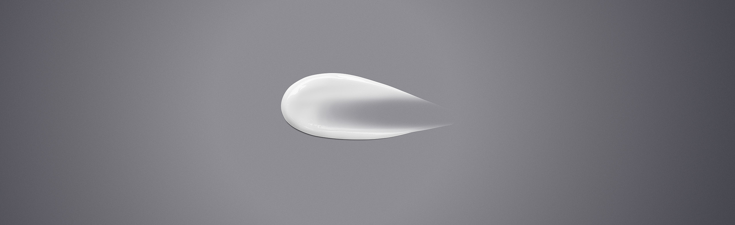 Modern skincare cream on a glossy gray background; a white cream swatch in a curved tear shape centered