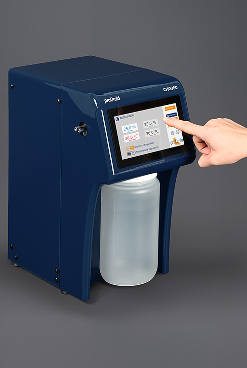 proUmid CHG300 humidity generator – user operating the intuitive touchscreen to set humidity and temperature